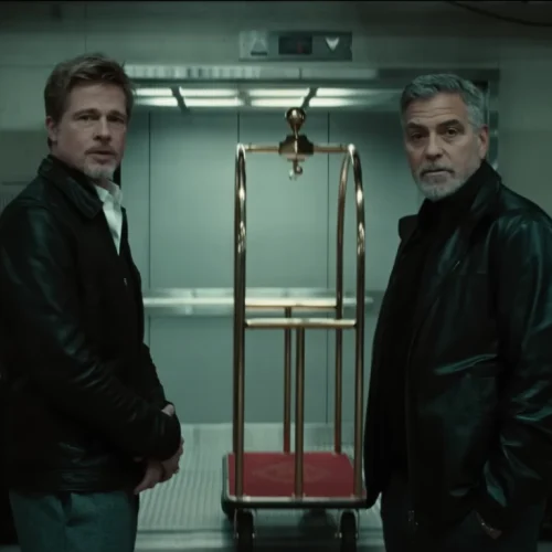 George Clooney e Brad Pitt em cena de Lobos, filme recorde da Apple TV+, que conquistou 96 países em uma semana de estreia.